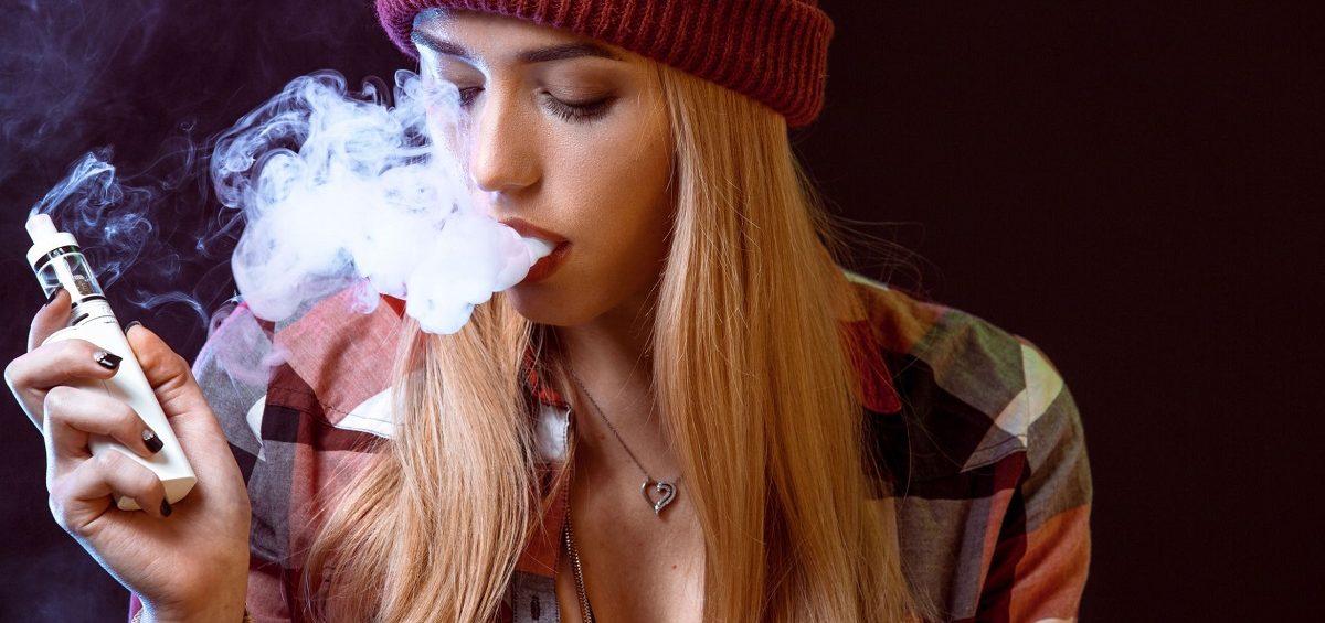 Image of a girl vaping